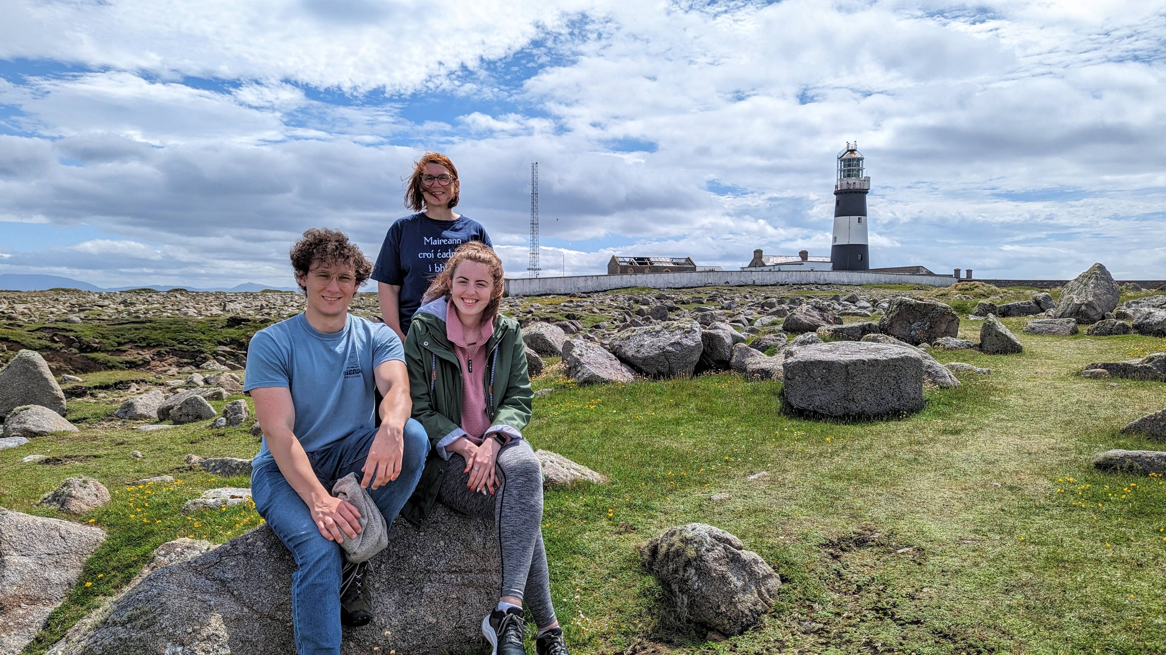 Teacher Gearóidín and two participants at the Tory Island Lighthouse