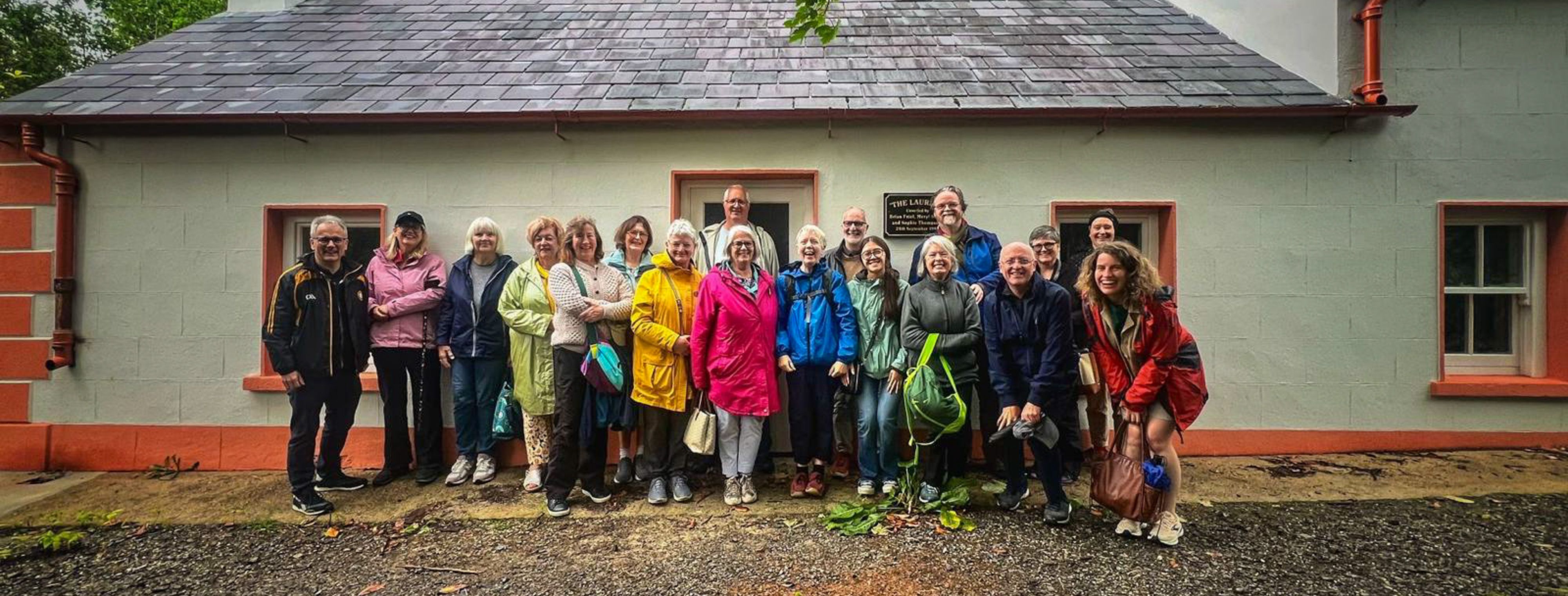 Oideas Gael course participants outside The Laurels, the house where Brian Friel was raised