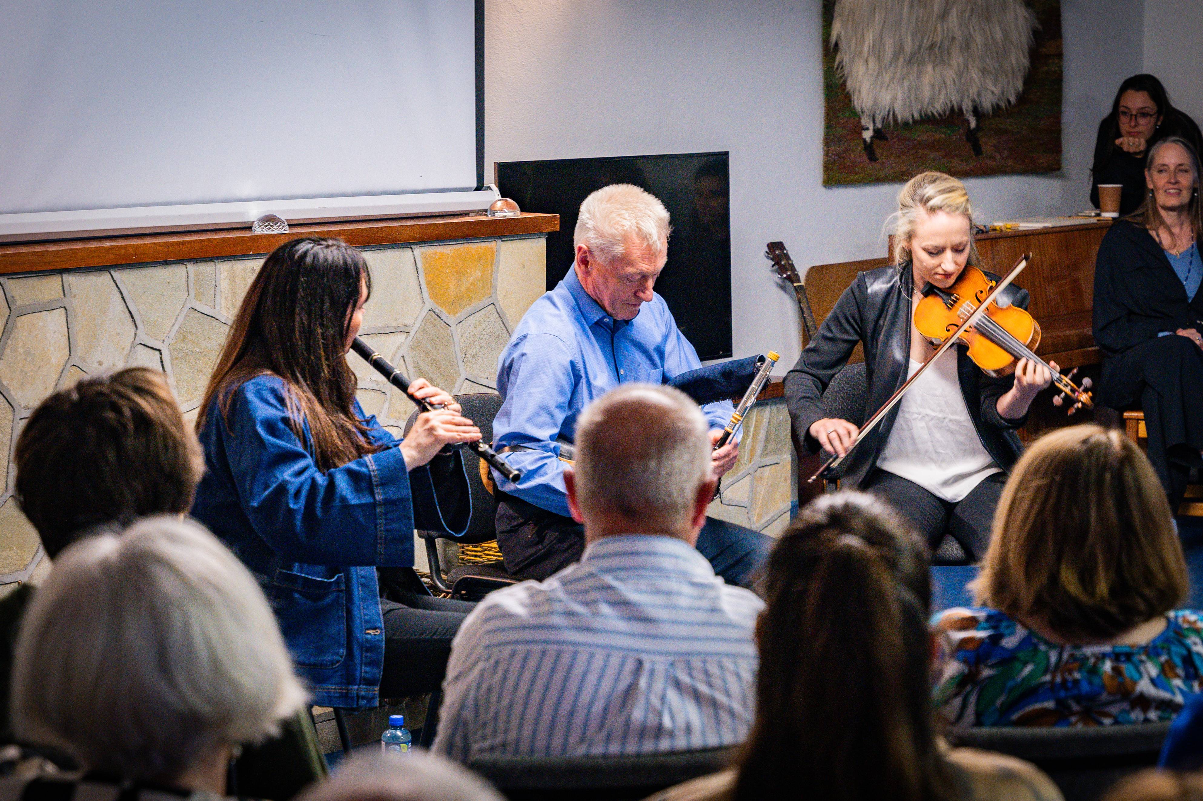 Emer Mayock (flute), Mick O'Brien (uileann pipes) and Aoife Ní Bhriain (fiddle)