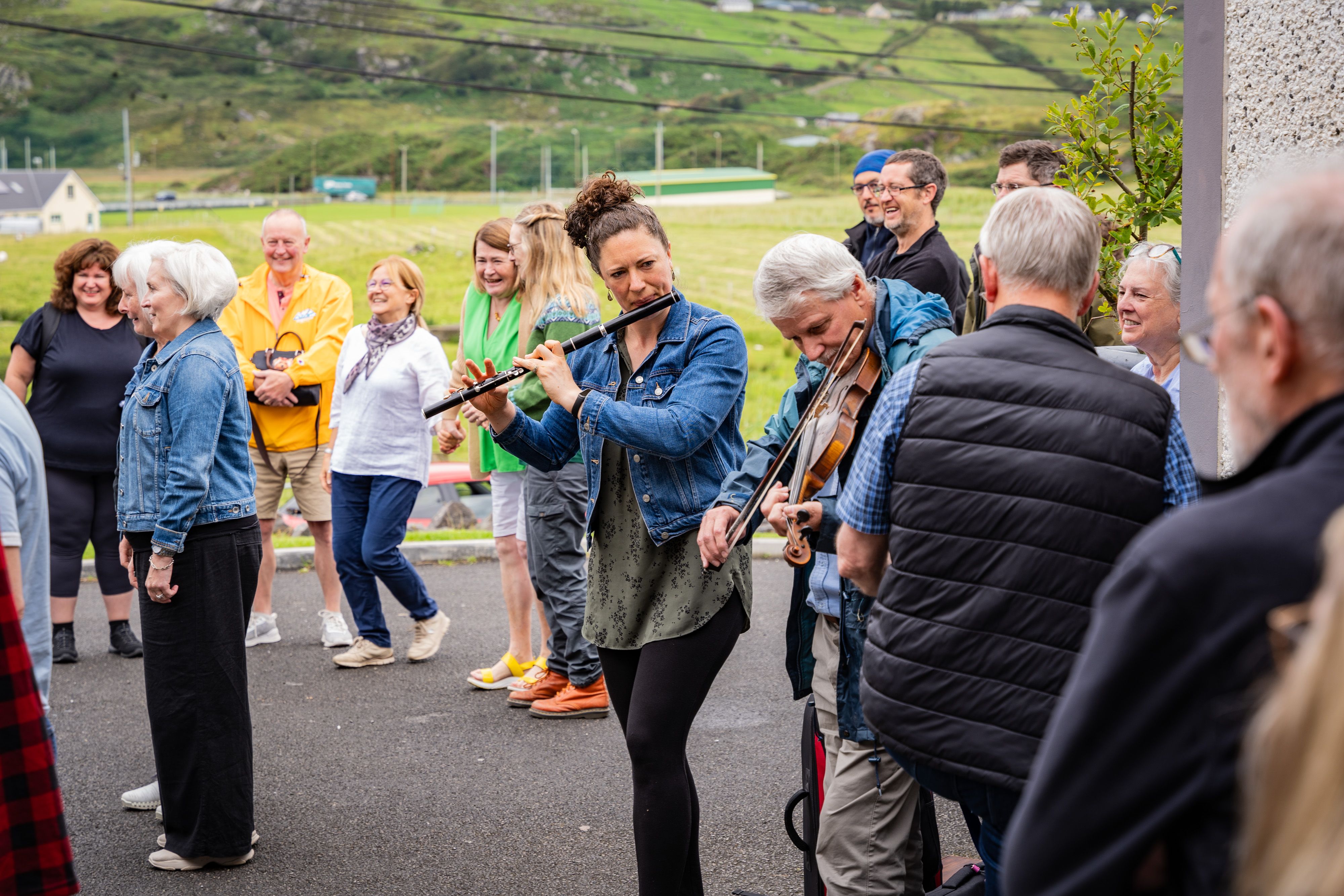 Musicians Meaghan Haughian and Liam Ó Néill playing outside Oideas Gael during one of its Summer Schools
